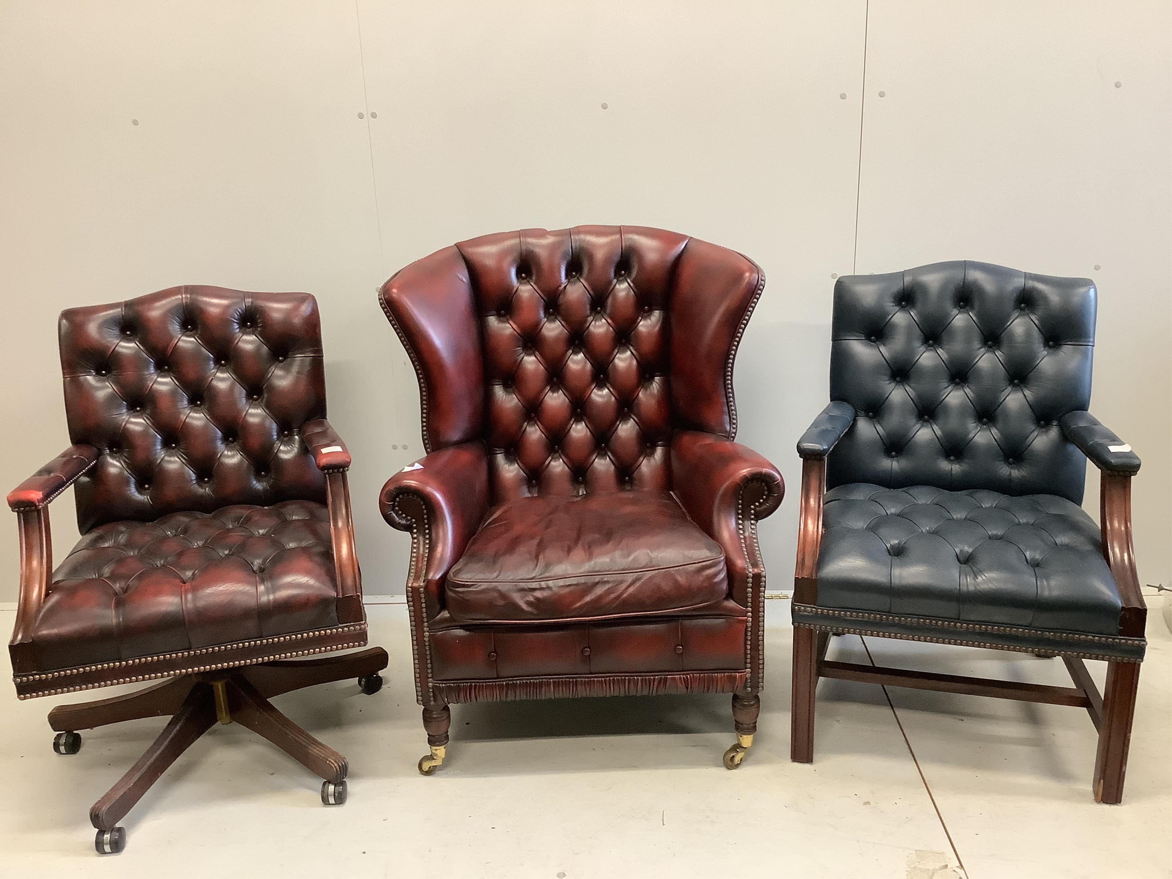 A burgundy leather upholstered wing armchair, width 86cm, a revolving desk chair and a Gainsborough style chair. Condition - all a little dusty but otherwise fair to good